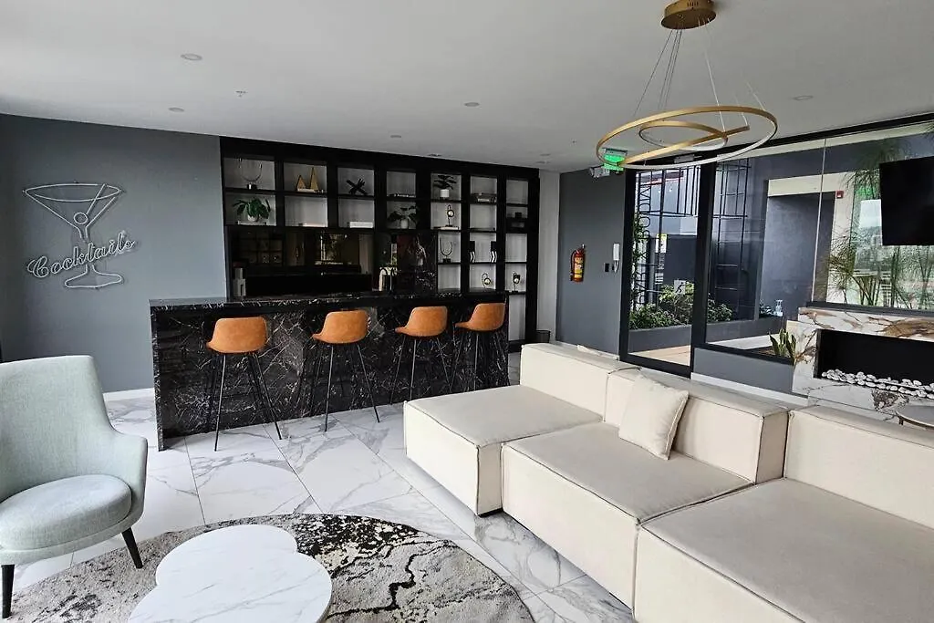 キトEdificio Xoe - Piso 17 Parque La Carolinaアパートメント アパート